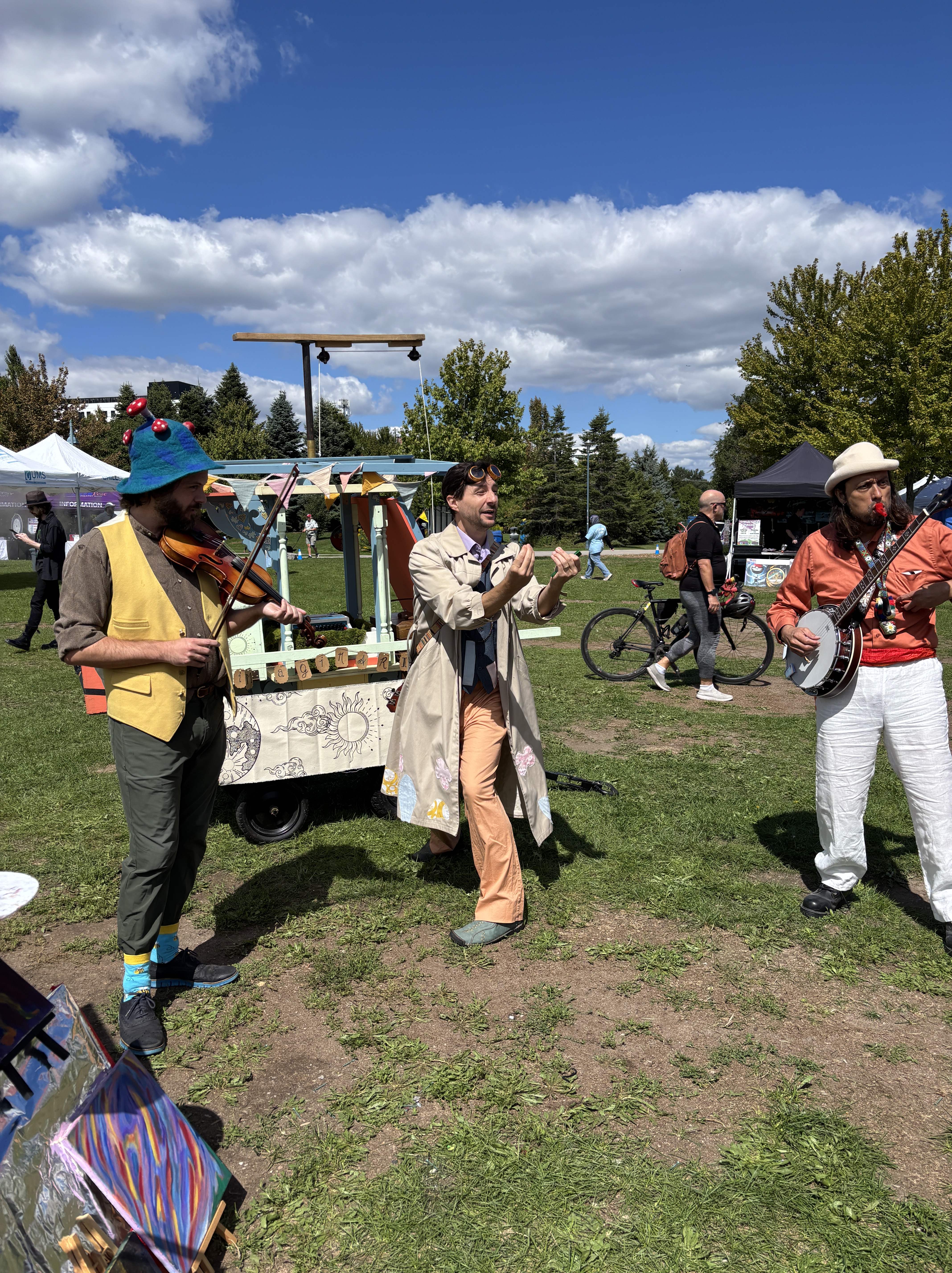 Pastel has his hands out towards the crowd and an expression on his face asking a question