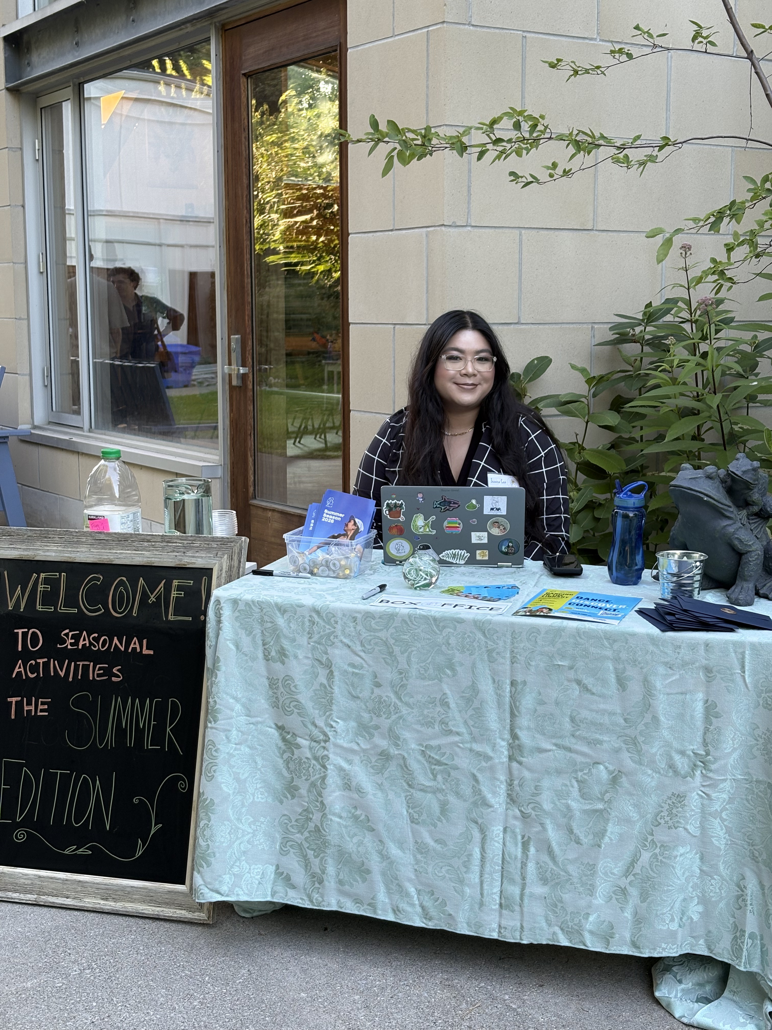 Frog in Hand's Jessica Cen welcoming guests at the check in booth