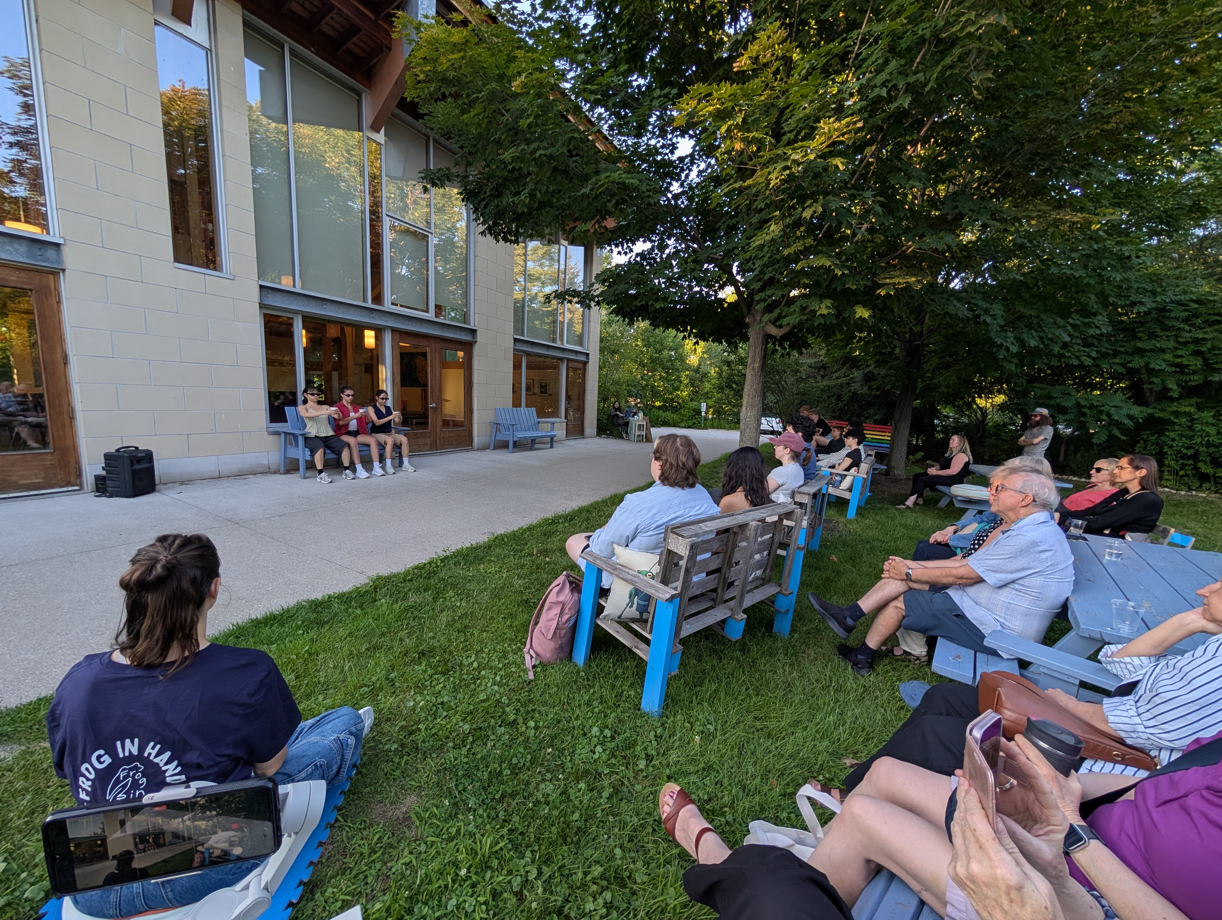 the audience watches the dancers perform