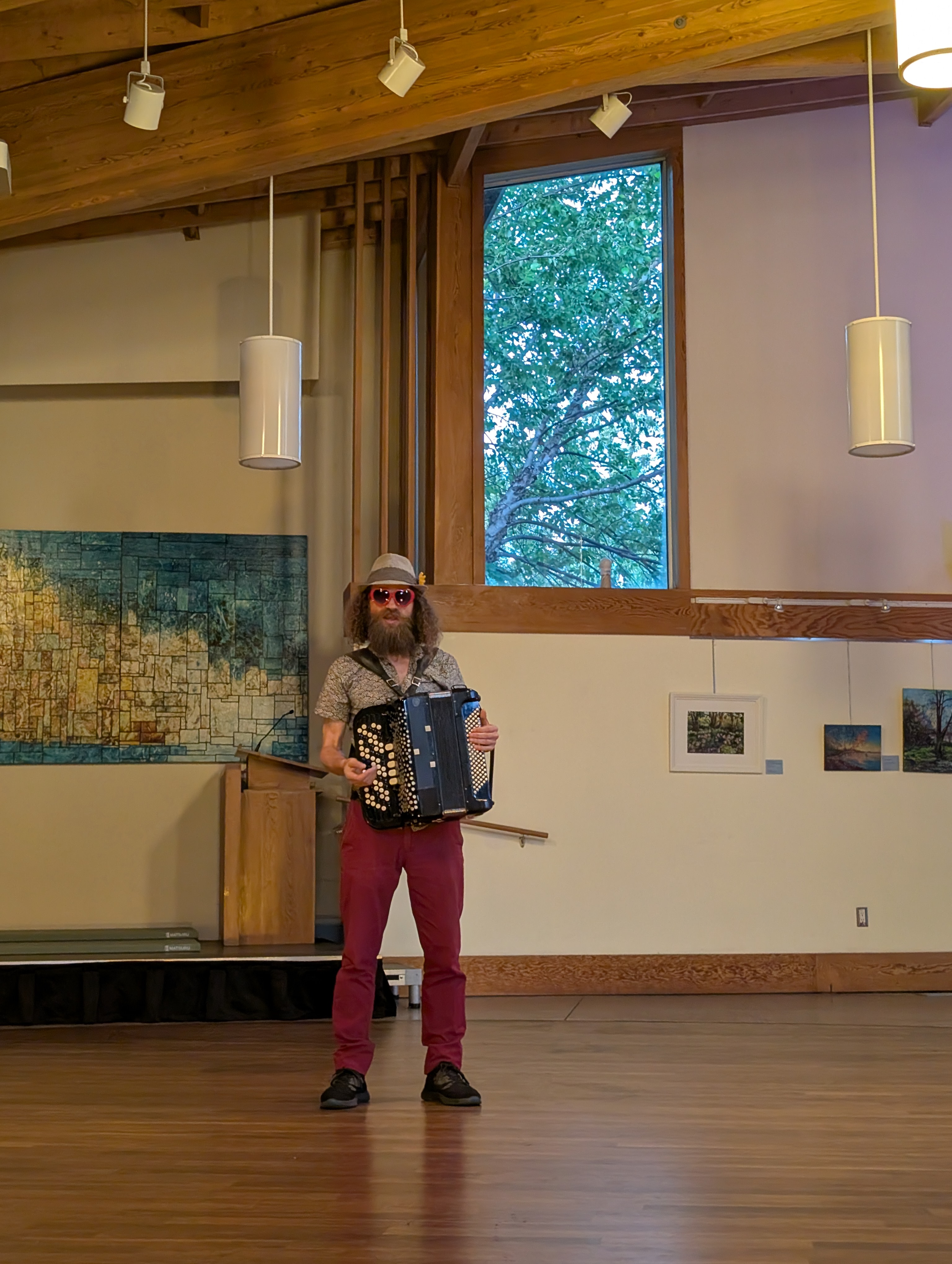 Tangi plays his accordion