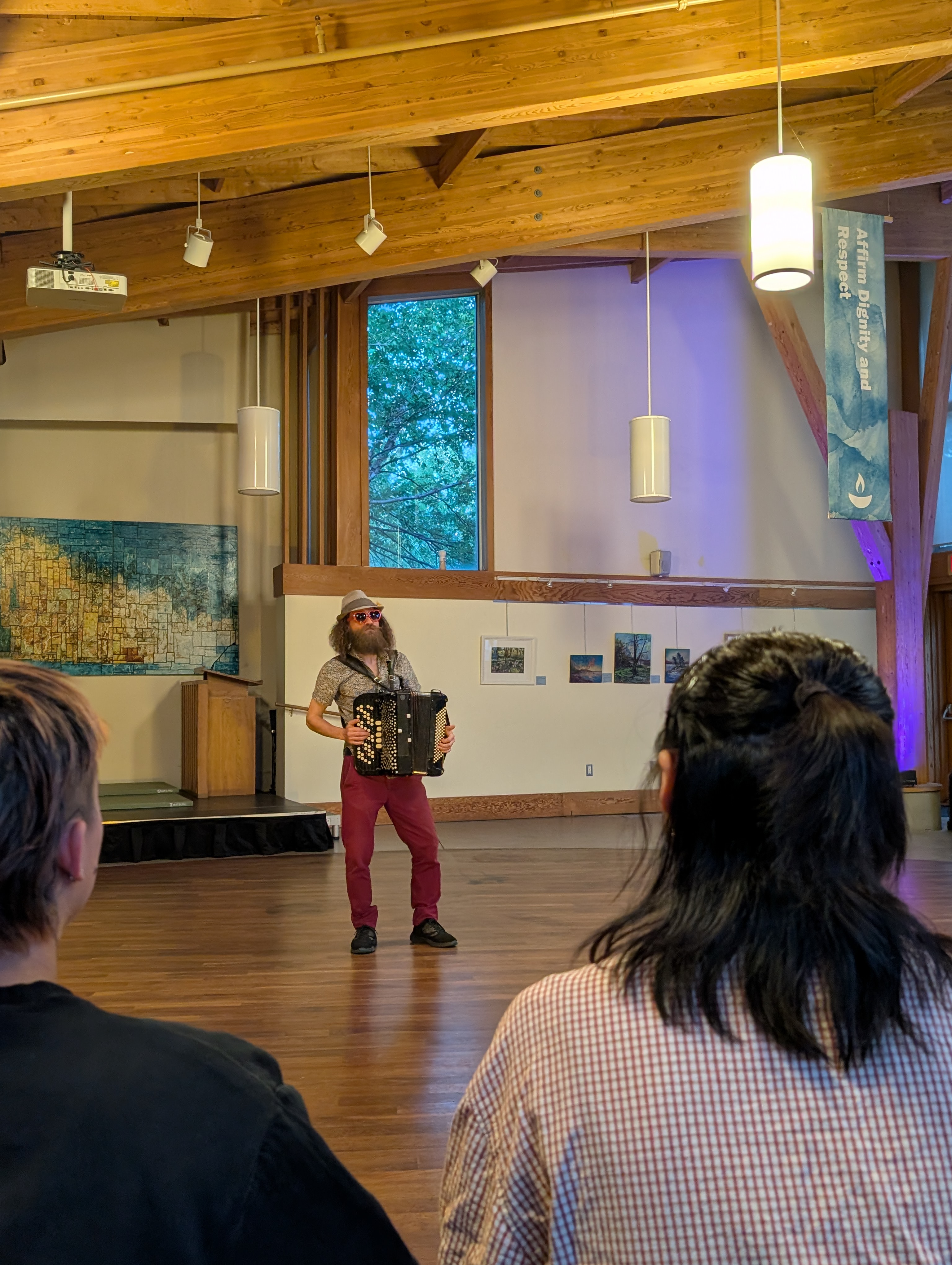 Tangi plays while the audience watches